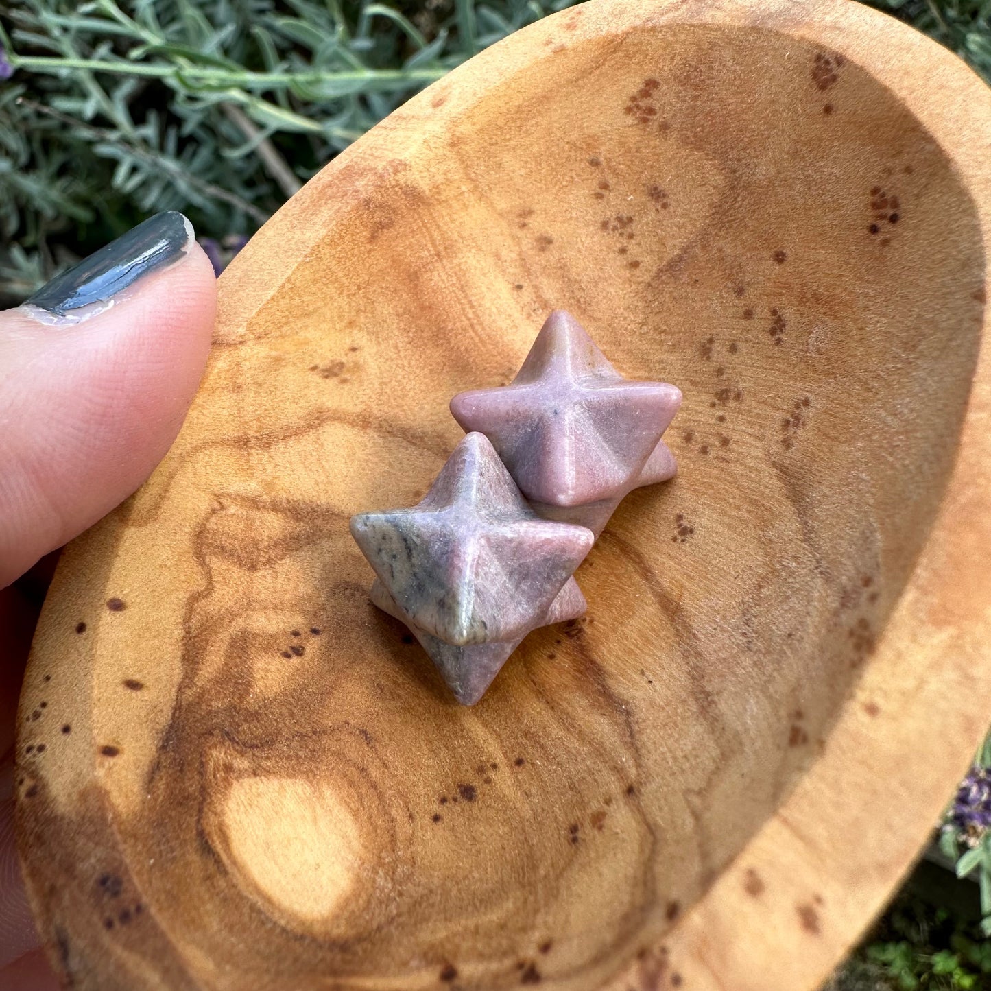 Merkaba shaped pocket stone