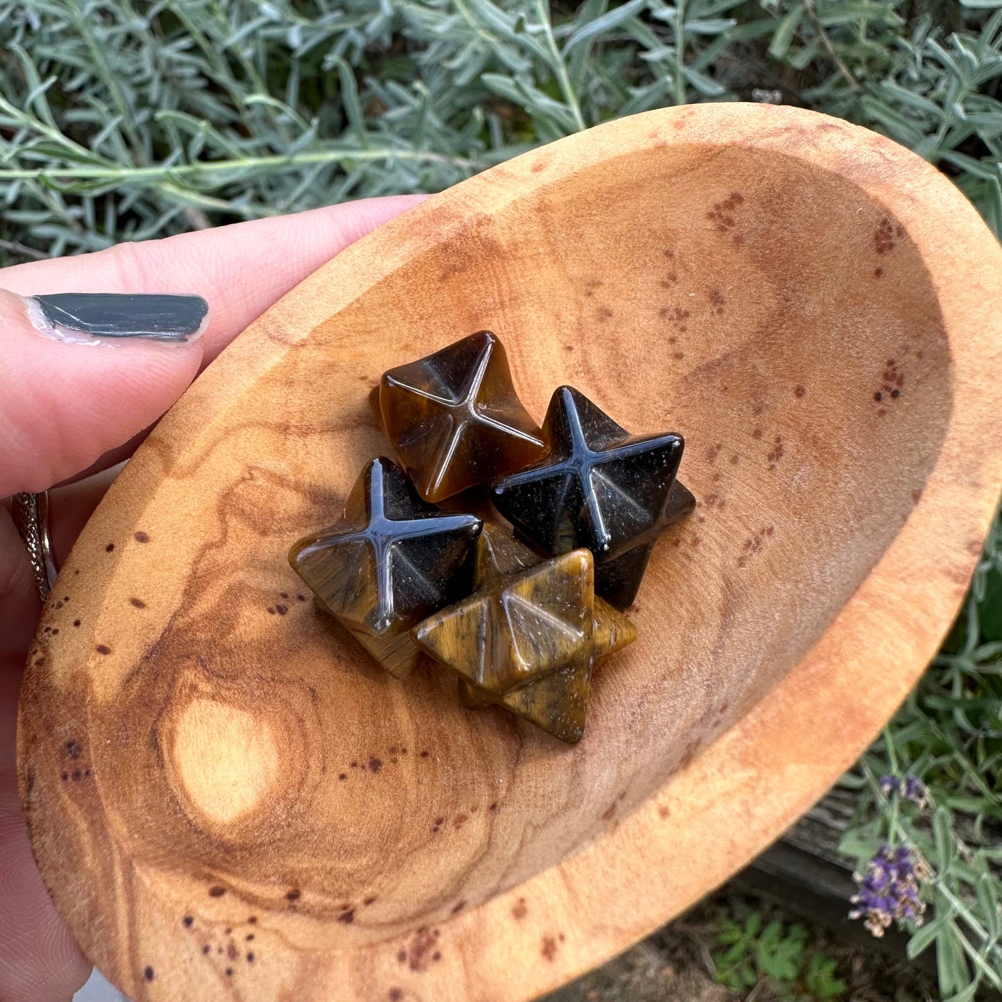 Merkaba shaped pocket stone